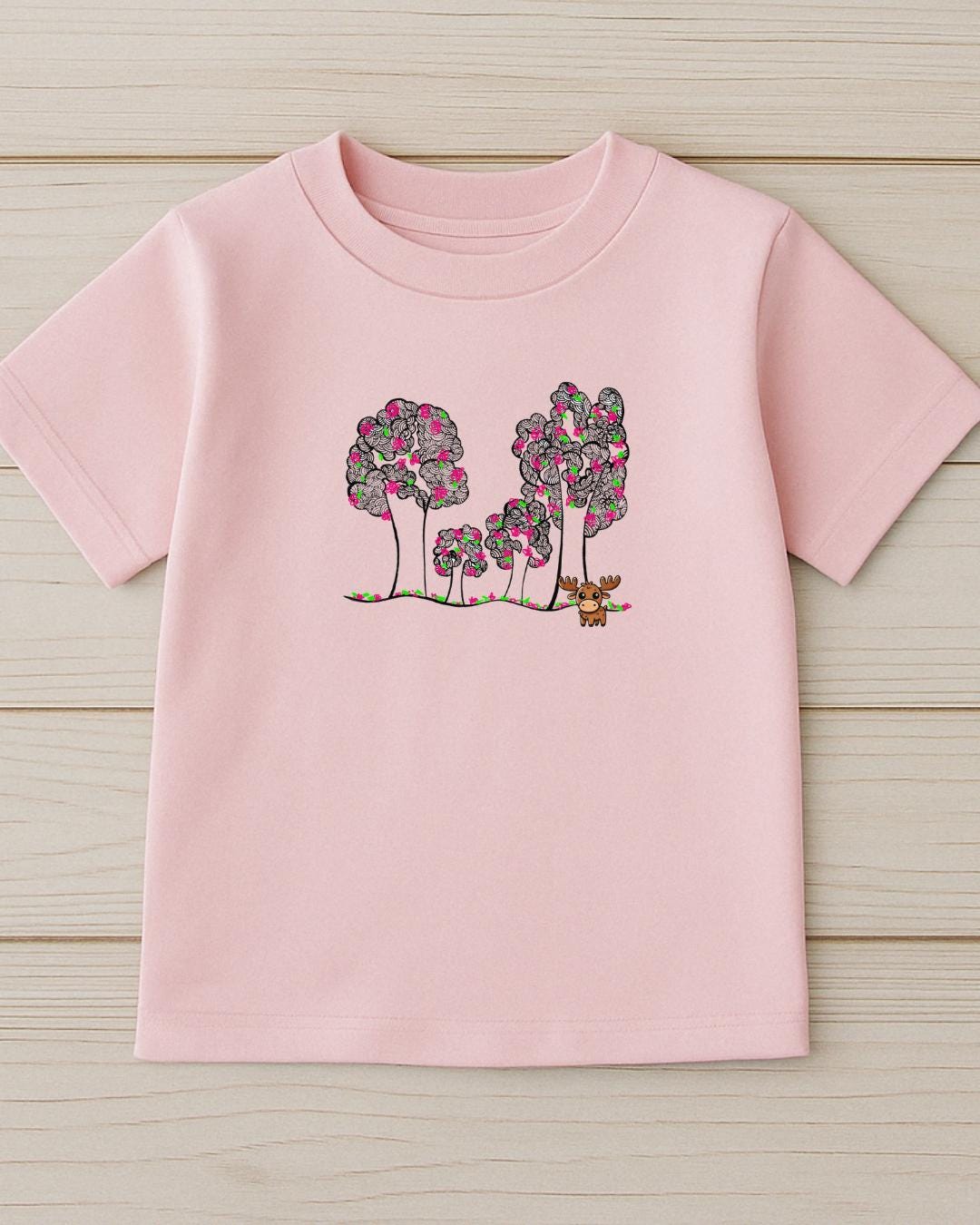 Child wearing Moosi in the Park Doodle Tee, whimsical kids shirt with playful tree doodle artwork