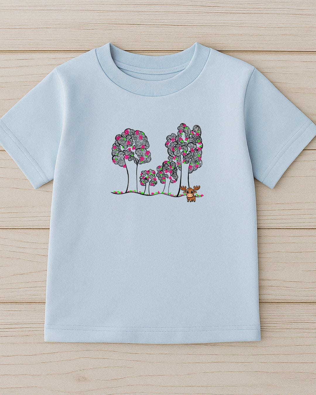 Close-up of whimsical tree doodle design on Moosi in the Park Tee – playful kids cotton shirt detail